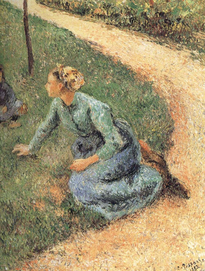 Peasant woman sitting on the side of the road